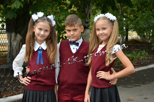 Дитячі в'язані жилети